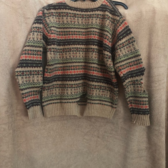 Newton Trading Co.destroyed Fair Isle Shetland wool sweater as seen on a model. - Picture 3 of 4